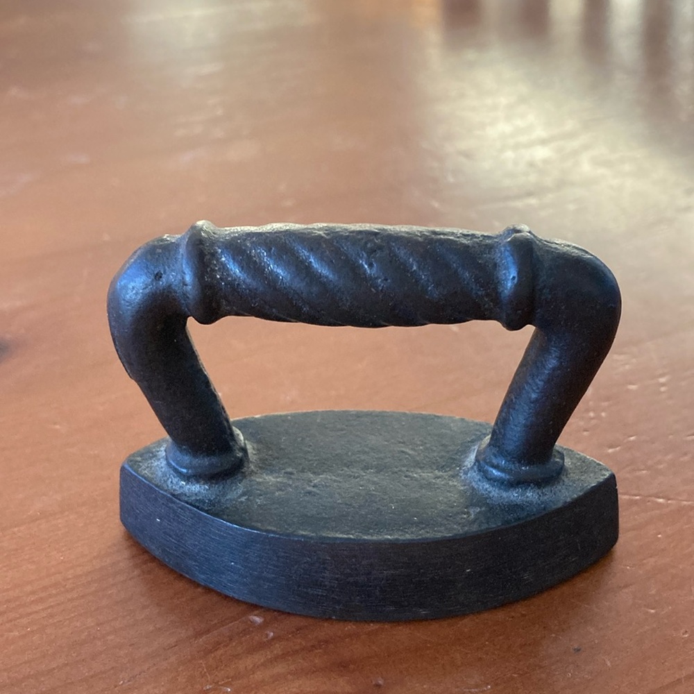 Antique child’s cast iron iron